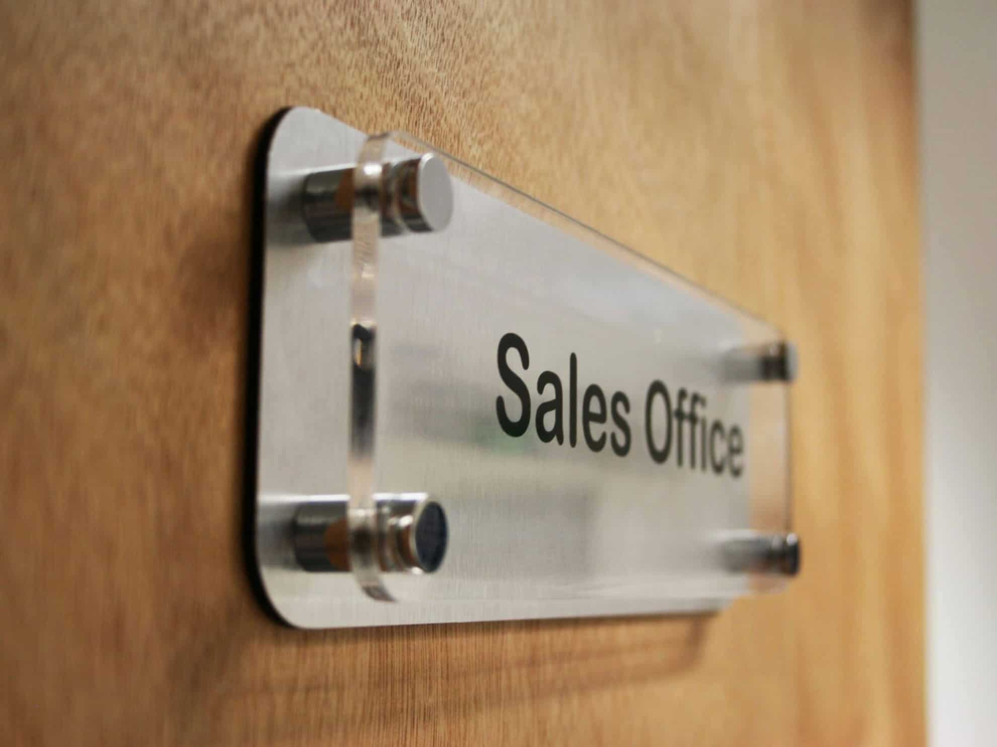 Sales office acrylic interior door sign