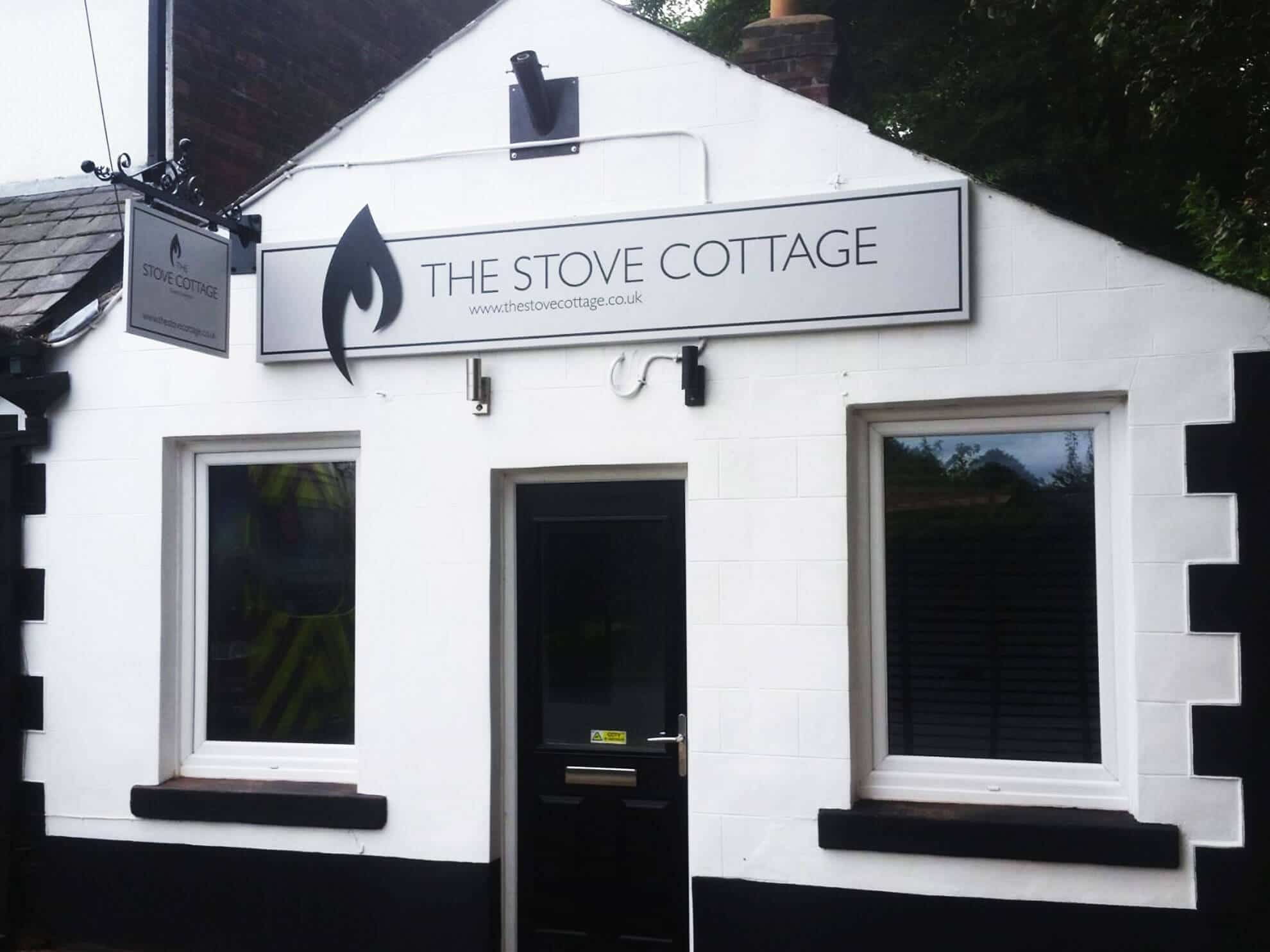 The Stove Cottage sign